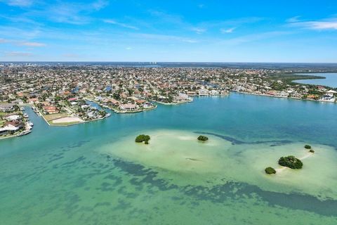 Arguably The Best Homesite On Marco Island!!! Highly Sought-After Rear Southern Exposure, .66 Of An Acre Tip-Lot With 293 Feet Of Direct Access Waterfrontage Overlooking The Shimmering Water and Picturesque Mangrove Islands Of Roberts Bay!! This Lot ...