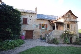 This splendid Quercy farmhouse tastefully restored is located in a small hamlet 10 minutes from Villefranche de Rouergue. This property is composed of a main body serving as a dwelling, a dovecote, a small house, a shed, all the outbuildings are rest...