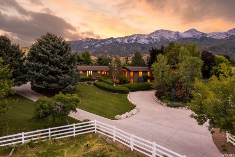 Experience pure paradise in Alpine, Utah! Nestled on 4.29 acres of exquisite horse property, this captivating treasure seamlessly blends rich history, tranquil serenity, and awe-inspiring natural beauty. As you drive up the welcoming lane, embraced b...