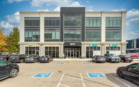 This Premium Office/Commercial Unit Is Perfectly Positioned Near Highways QEW & 403, In A Vibrant Area With Convenient Transit Access To The Go Station. The Brand New 2nd Floor Office Space, Currently In Shell Condition, Boasts A Bright Atmosphere Wi...