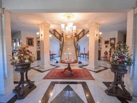 This impressive house is located in Madliena and is set on a plot of approx 1800sqm of land. The property opens up to a lavish staircase embellished with 18 carat gold with a formal living area on one side and a formal dining area on the other both v...