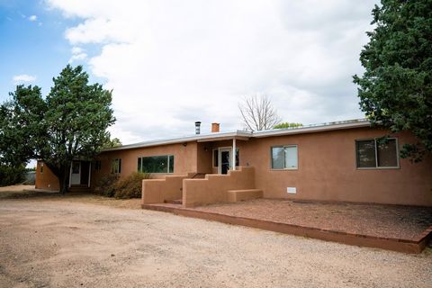 Discover the enchanting allure of this stunning Spanish-style home nestled in the heart of Santa Fe, NM. Situated on a large lot in a highly sought after locale, this home has tremendous potential. This charming abode boasts a spacious layout adorned...