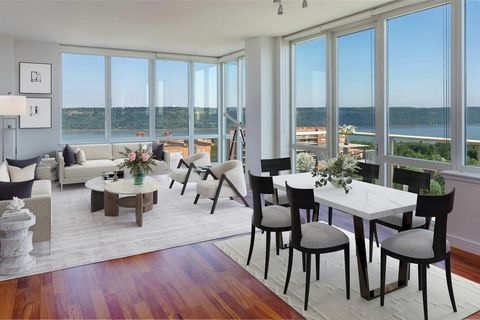 AMAZING NEW PRICE! Imagine that you are on top of the World at The Solaria Condominium PENTHOUSE. Everything at your fingertips with top of the line appliances and warm wood finishes on the European Shaker-style cabinetry in this windowed Chef's kitc...