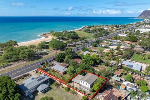 Large Hawaiian Homelands property! 4 bedrooms, 3 bathrooms, newer built in 1995 with over 2,155 living square footage! Large 10,280 square foot lot with Kukui Nut tree, Mango tree, Areca Palms, and Tiare plants on this beautiful lot. With ocean views...