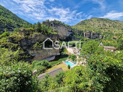 Située dans un charmant village de la commune de Sainte-Enimie (48210), cette maison offre un cadre idyllique au cœur des Gorges du Tarn, célèbres pour leur beauté naturelle et leurs innombrables sites touristiques. Bénéficiant d'une vue imprenable s...