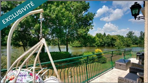 Cadre paisible pour cette propriété située en bord de rivière avec potentiel remarquable de gîte ou autre