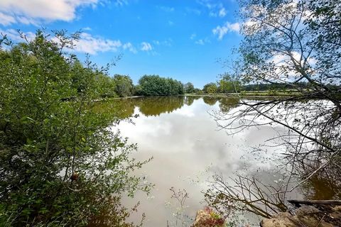 Grange avec étang et 4ha de terrains