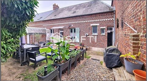 Maison de ville vivable de plain pied avec jardin
