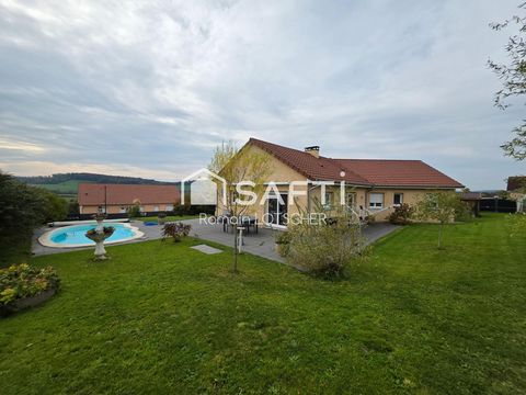 Maison de plain pied sur sous sol avec piscine