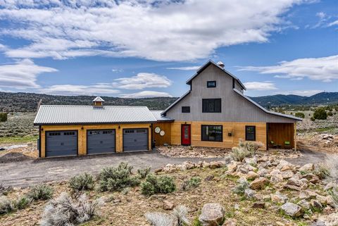 Beautiful one of a kind barn style home situated on the hill overlooking the Virginia City Highlands Valley, up a scenic road away from the city bustle and in your own little nature paradise. Step into this spacious 3 story home with cathedral ceilin...