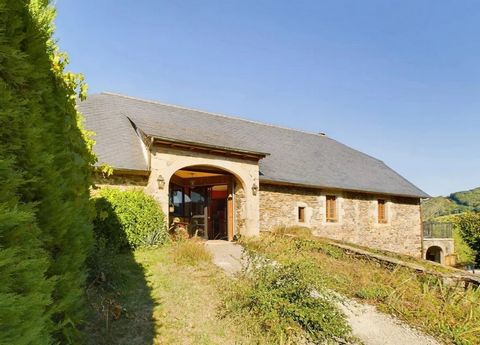 We are pleased to offer this unique property nestled in a hamlet setting, on the gorge of the Val de Cère, an impressive barn renovation with its guesthouse. A restored barn of good proportions, sympathetically completed 20 years ago with its stone w...