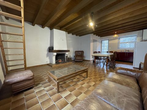 Semi-detached village house of approximately 61m² of living space for a total useful surface area of approximately 220m² including the outbuildings which offer many possibilities (creation of other accommodation for rental) but which need to be compl...