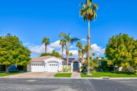 Welcome to this charming Hacienda in VIENTO, a gated community of only 23 homes in the desirable Tamarisk area. Enter through a beautifully landscaped yard into a Private Courtyard with tiered fountain and Saltillo Tiles that exude Hacienda charm. Ta...