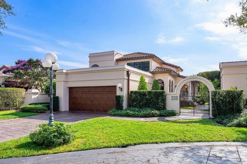 Nestled within the luxurious Villa D' Este community, the crown jewel of Deer Creek, this exquisite two-story residence with private pool and courtyard awaits its new owner. This inviting home was decorated by one of Florida's most prestigious and re...
