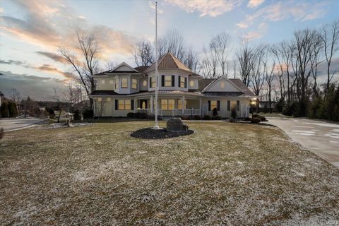 Welcome to this exquisite County-Victorian home nestled in the highly desirable Granger, Indiana. With five bedrooms, four full bathrooms, and two half bathrooms, this meticulously crafted residence offers a perfect blend of elegance, comfort, and qu...