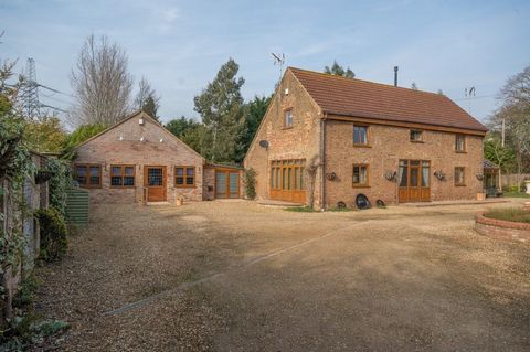 In a quiet, private setting in a hamlet in the West Norfolk countryside close to the borders of Cambridgeshire and Lincolnshire, an extensive property converted from a mid-19th century barn sits on two acre grounds sheltered by an abundance of mature...