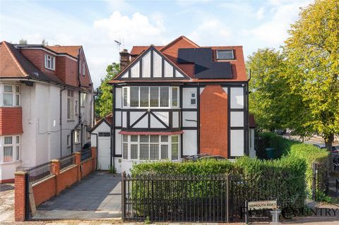 This outstanding detached seven-bedroom residence, boasting 3,875 square feet of elegantly refurbished interiors, perfectly blends traditional Tudor Revival charm with contemporary luxury. Situated in a sought-after location, the property features di...