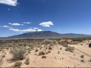 Perfect opportunity. This 1 acre has views to ABQ lights and Sandias. The 1/2 acre next to it is also for sale for 48K making it a total lot that is comparable to the lot just south that has a gorgeous custom home on it.