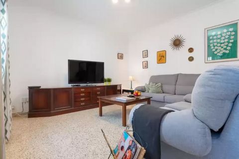 Experience the gentle sea breeze from the front terrace of this inviting house, perfect for reading or enjoying coffee while watching the lively street. The warm climate encourages leisurely strolls to the nearby sea, where you can cool off at your l...