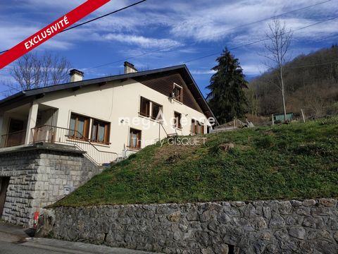 At the foot of the Biros Valley, a small valley in the central Pyrenees located in the Couserans region, west of the Ariège department, large building comprising two houses built on a cellar and garages on a plot of 1000 m². This house with mountain ...