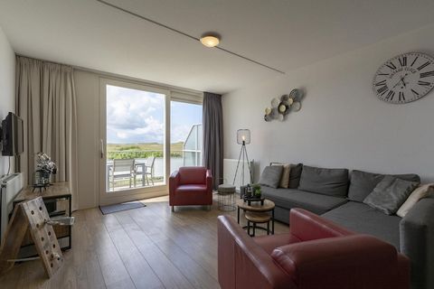 Modern appartement voor 4 personen op loopafstand van strand Groote Keeten. Heerlijk appartement aan de voet van de duinen, een echte aanrader voor strandliefhebbers! Het appartement ligt op de 2e verdieping en heeft een balkon met uitzicht op het du...