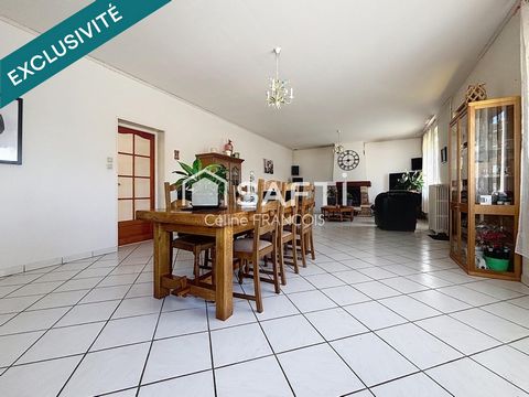 Maison familiale avec garage et terrain