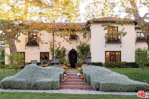 Designed by famed architect Clarence J. Smale in 1928, this timeless Mediterranean home blends historic character with modern comfort on one of Windsor Square's most coveted blocks. Gracefully set back from the street and framed by mature sycamores, ...