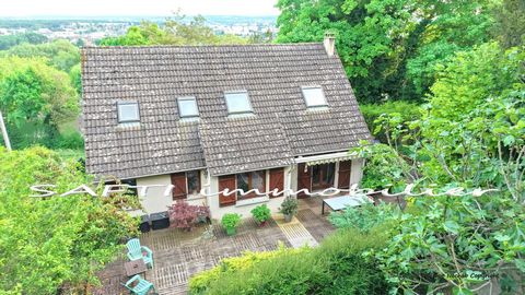 Maison individuelle non mitoyenne de 115m2 habitables - 3/4 chambres - sous-sol total sur 1446m2 de terrain entièrement arboré et paysagé .