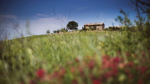 The property is located at the top of a hill, to which you arrive via a road, characterized by soft curves, surrounded by high cypresses that embellish it. This iconic image of the Tuscan landscape, is one of the most famous and photographed location...