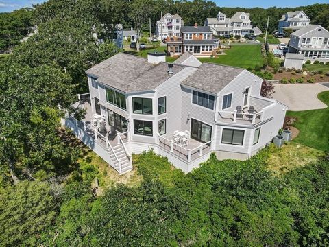 Spectacularly positioned overlooking Lewis Bay, this waterfront home offers unparalleled views with deeded beach rights. Floor-to-ceiling windows capture an abundance of natural light. Lounge and entertain on the wrap-around deck with chic SS cable r...