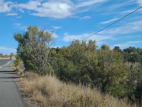 Looking for an exciting business venture or investment property? Look no further. Located off of NM 14 this 1.42 acres commercial property (zoned C-1) already has a cleared & prepped building pad. The hopping location is only minutes to I-40, Albuque...