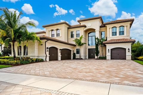 Combining stylish traditional and chic modern designs, this stately six bedroom, seven bathroom lakefront residence offers this 8,259+/- square feet of living space. Privately nestled on a quiet street in the ultra-opulent Seven Bridges of Delray Bea...