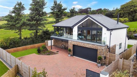 A very rare opportunity to acquire a luxury, executive 4 bedroom detached home on the outskirts of the desirable village location of Ashford and enjoying lovely estuary views to the south facing front elevation, over the Taw Estuary and beyond. The p...