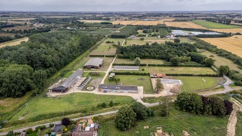 This rarely available equestrian riding centre with stabling, indoor and outdoor schools and former teaching block. Covers approx. 19 acres ( stms)and was part of the former College of West Anglia. Change of Use of equestrian centre to domestic eques...