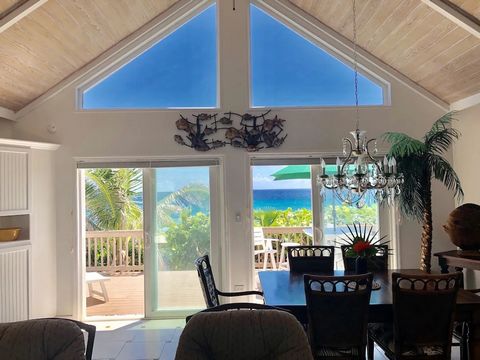 Situated in a desirable upscale neighborhood, this beautiful home is ocean front on a white sandy beach. The home has 2 ocean view bedrooms, each with its own bathroom at separate ends of the home. There is a full wet bar, and built-in laundry area. ...