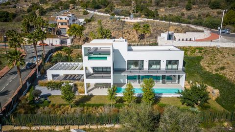 This villa is designed in a contemporary architectural style, with fine clean lines and large windows. The 547 square meters built area is distributed on two floors and a basement, where the finishes in noble materials stand out, the bright rooms and...