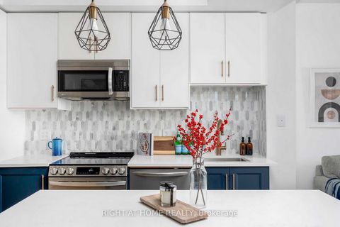 Welcome to Bohemian Embassy condos in the Heart of Vibrant Queen Street West. This Bright South-Facing, Turnkey, Tastefully Renovated, 1 Bedroom and Den Unit Layout is Rarely Offered. Perfect for the Home Chef & Entertainer - New Modern Kitchen w Sof...