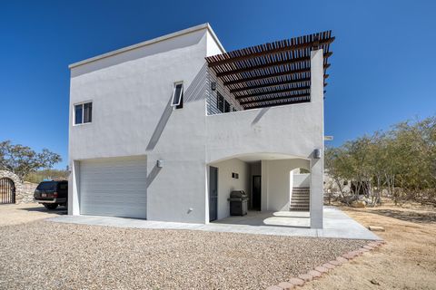 Perfect turn key home Casa de Ocio is tucked in the neighborhood of Palo Blanco on a quiet peaceful cul de sac. A few minutes north of downtown LB close to the beach and Tres Palapas Newer construction and move in ready Upstairs you will find 1 bedro...