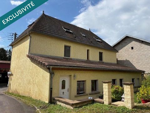 Ensemble immobilier avec garages et terrain