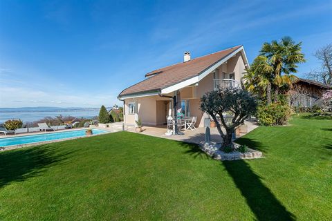Exclusively in Maxilly sur Leman, this very luminous architect's villa of 170 m2 (including an independent flat) stood on 1126 m2 of land with a panoramic lake view, in a quiet area. Inside on the garden level : Entrance with cupboards, wc, fitted ki...