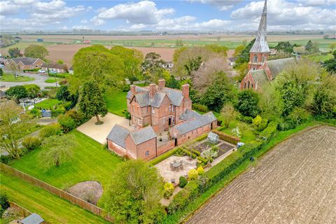 A splendid, Grade II Listed, Victorian, former vicarage with far reaching views, stands in a village almost equidistant between Spalding and Boston in a semi-rural area near nature reserves and The Wash, yet with excellent schools in catchment. In su...
