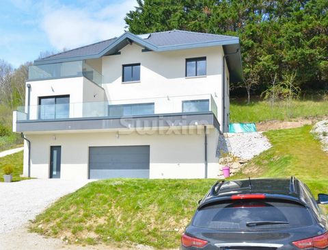 Ref: 67390FD, Epagny/Bromines sector, next to Pringy, 5 minutes from the Annecy-Nord motorway exit, Annecy hospital, in a dominant position with a view of Lake Annecy from the terraces, magnificent 2021 villa offering large volumes on 856 m² of land....