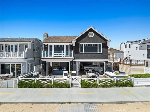 A timeless Hampton’s-inspired beach home set on an enviable 45' wide parcel along the Balboa Peninsula oceanfront strand. Light, bright and abundantly spacious interiors convey a sophisticated, beach-chic style that comes across as effortless and cal...
