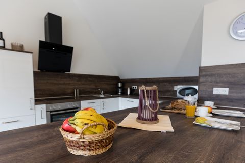 Our Penthouse Honeymoon No. 3 is part of a thatched house and is located in the vacation complex Residenz am kleinen Meer, which consists of five houses. You can expect a quiet, on the outskirts of the village located complex with its own lake very c...