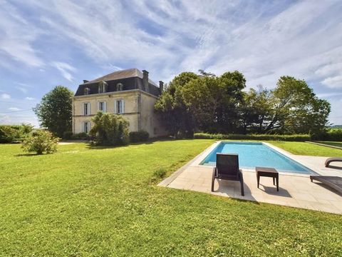 This magnificent 19th century manor house is set in a dominant position with wonderful views of the surrounding vineyards of St Emilion. The property comes with 1.7 acres of beautiful grounds, swimming pool and outbuildings. The property has been bea...