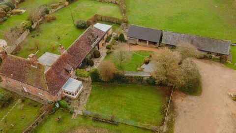 Embrace a unique and unparalleled opportunity to own a picturesque slice of countryside living in the idyllic village setting of Twyford. Nestled alongside the tranquil River Itchen Navigation, this property comprises a charming four bedroom farmhous...