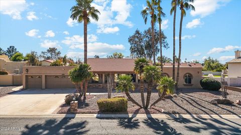 This is your chance to own a piece of paradise in the heart of Phoenix! Nestled on a large 1/2 acre lot, this home offers plenty of space for outdoor living and entertainment. From the moment you drive up, you will be charmed by the unforgettable cur...