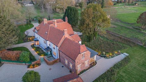 Welcome to an extensively renovated Grade II listed Georgian farmhouse of 4,808 sq. ft. having historical roots dating back to the1100’s and a principal structure originating in 1565. Seamlessly integrating historical charm with contemporary technolo...