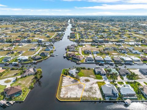 Welcome to your waterfront sanctuary! Nestled on a .55-acre tip lot with an expansive 24,096 square feet of space, this saltwater gulf access double lot offers a rare opportunity to indulge in waterfront living at its finest. Boasting an impressive 3...