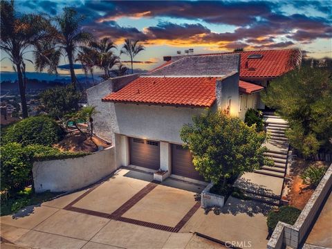 Located at the peak of Summit Drive, on one of the most desirable street of Mar Vista Heights, this prestigious Whittier home is custom-built with extraordinary, unique architectural designs and features that set it apart from other Whittier homes. T...